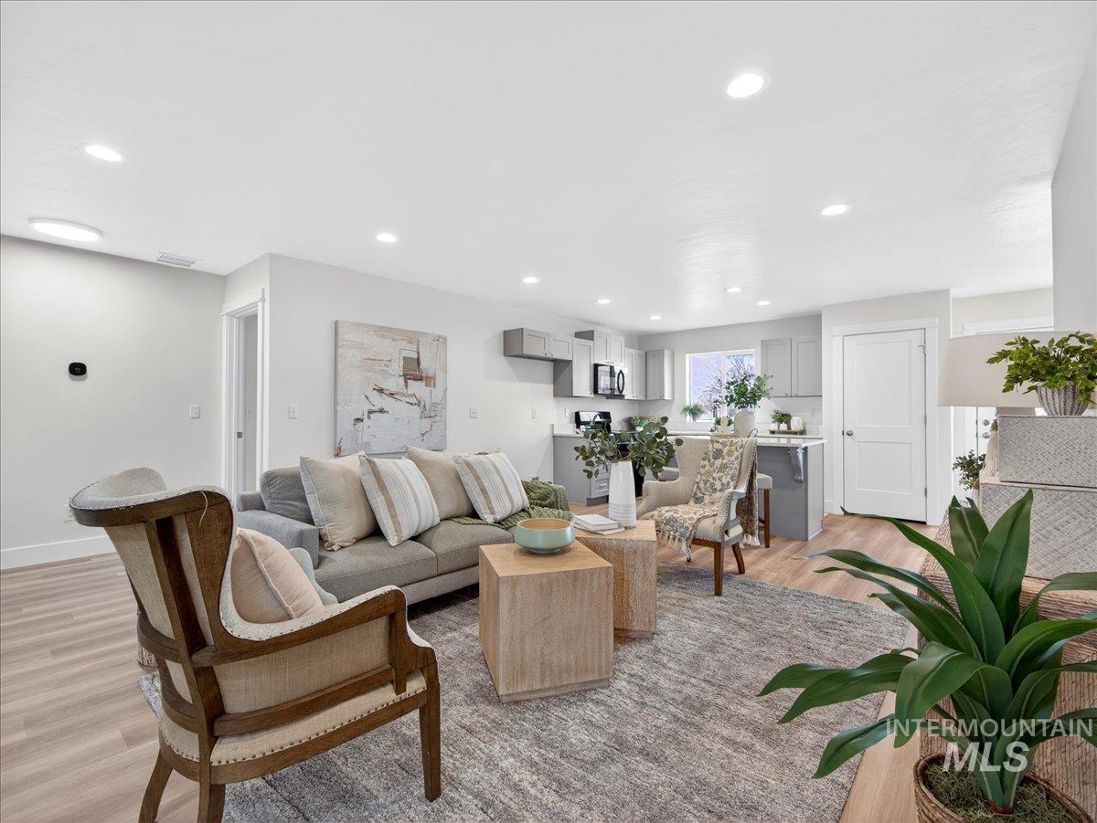 1611 Regency Way Emmett, ID 83617 - Photo 9 of 47 Living room featuring light wood-style floors and recessed lighting