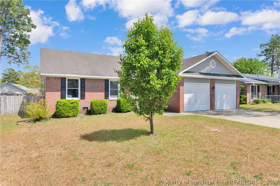 709 Riyhad Road Fayetteville, NC 28314 - Photo 3 of 29 front view of a house with a yard