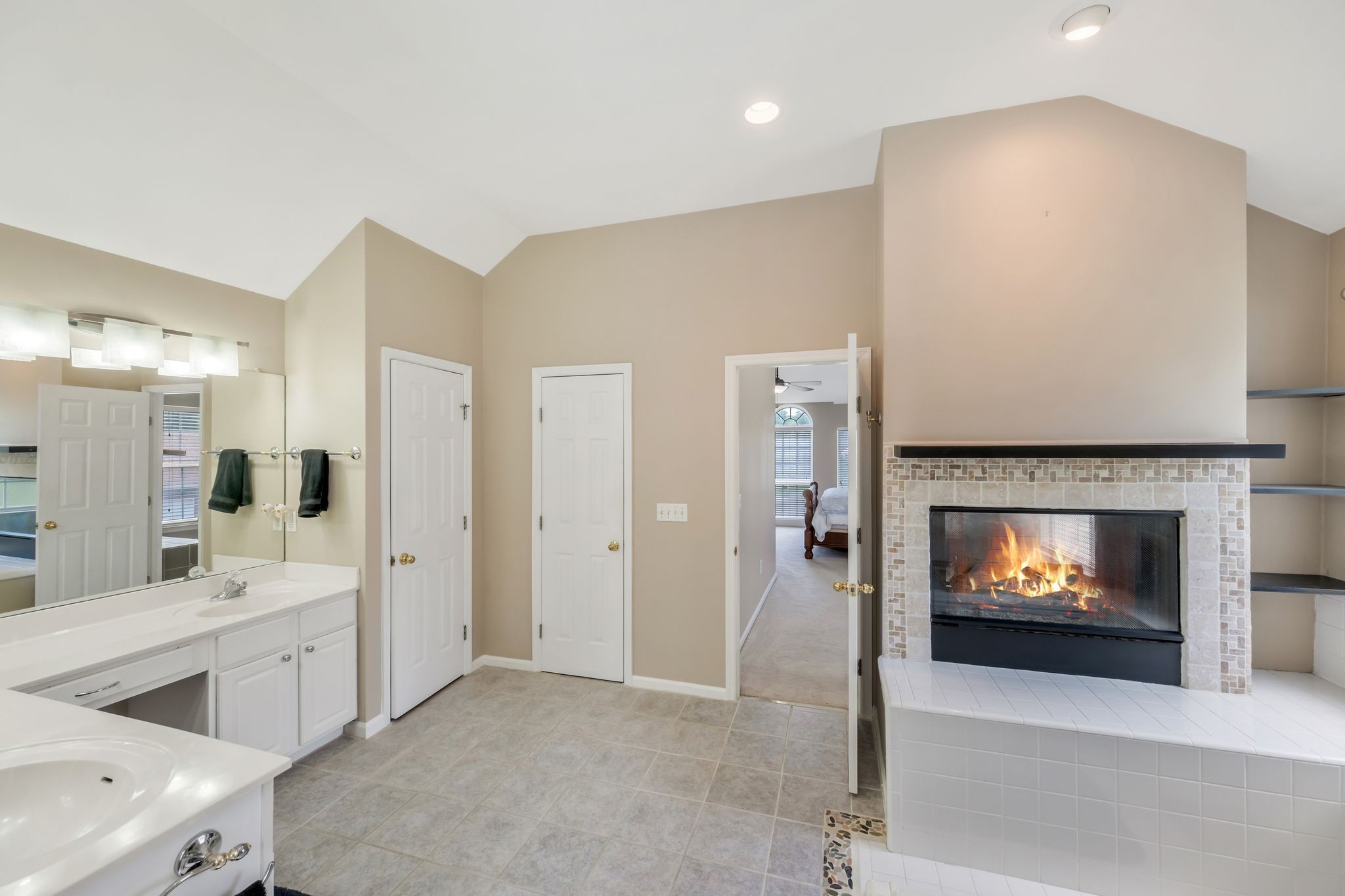 1757 Shane Drive Spring Hill, TN 37174 - Photo 20 of 30 a living room with furniture a fireplace and a flat screen tv