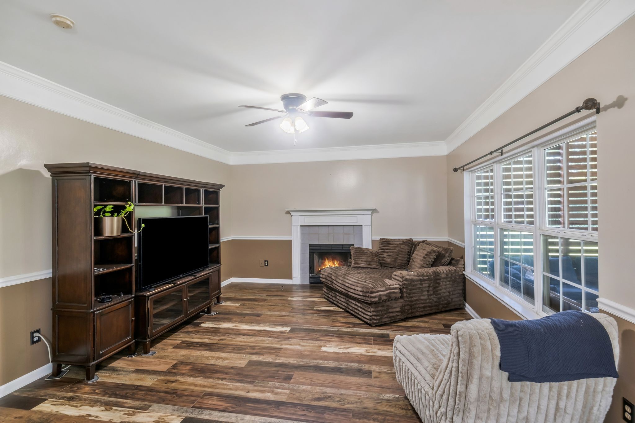 1757 Shane Drive Spring Hill, TN 37174 - Photo 22 of 30 a living room with furniture and a flat screen tv