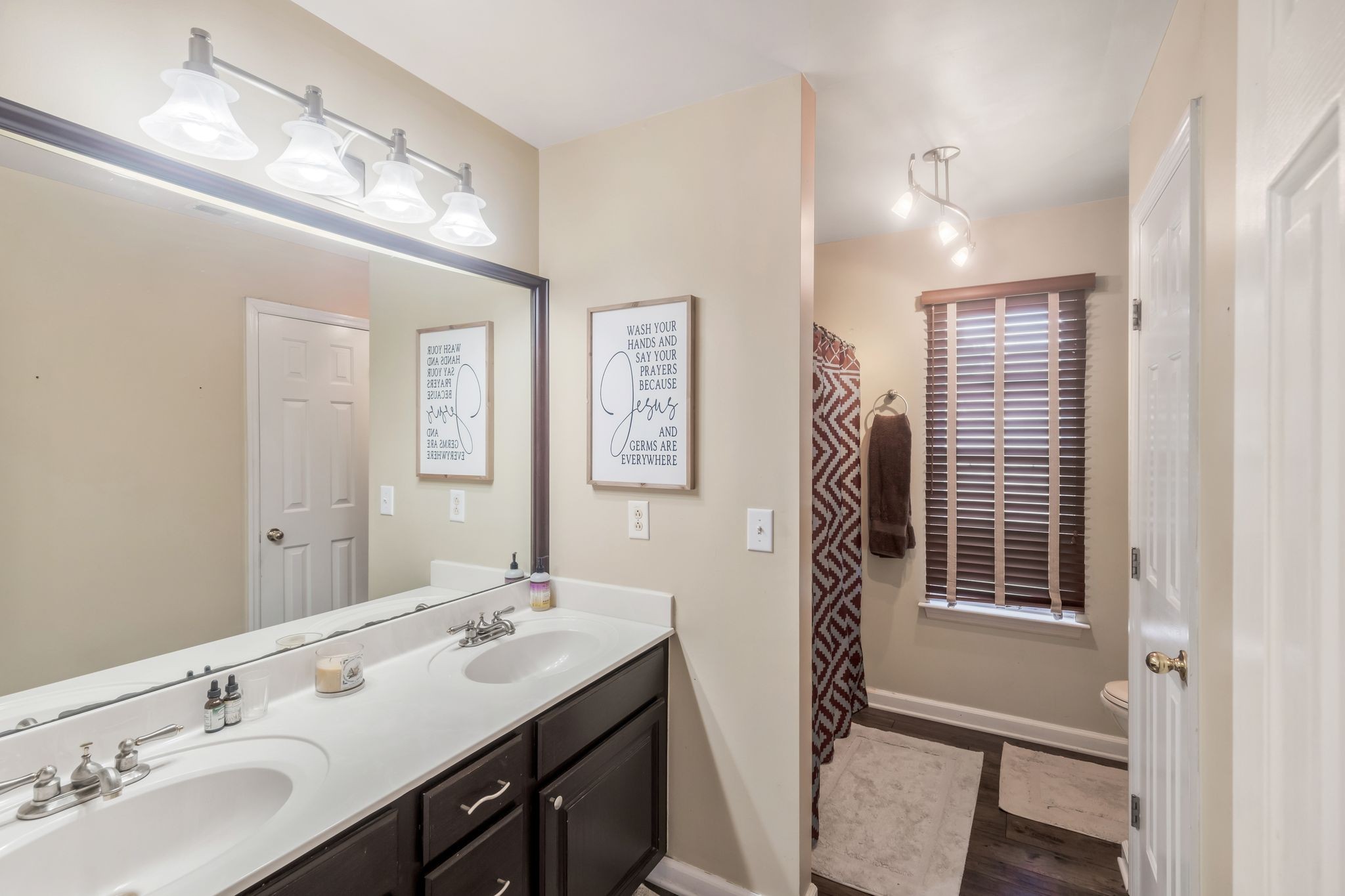 1757 Shane Drive Spring Hill, TN 37174 - Photo 27 of 30 a bathroom with a sink double vanity and a mirror