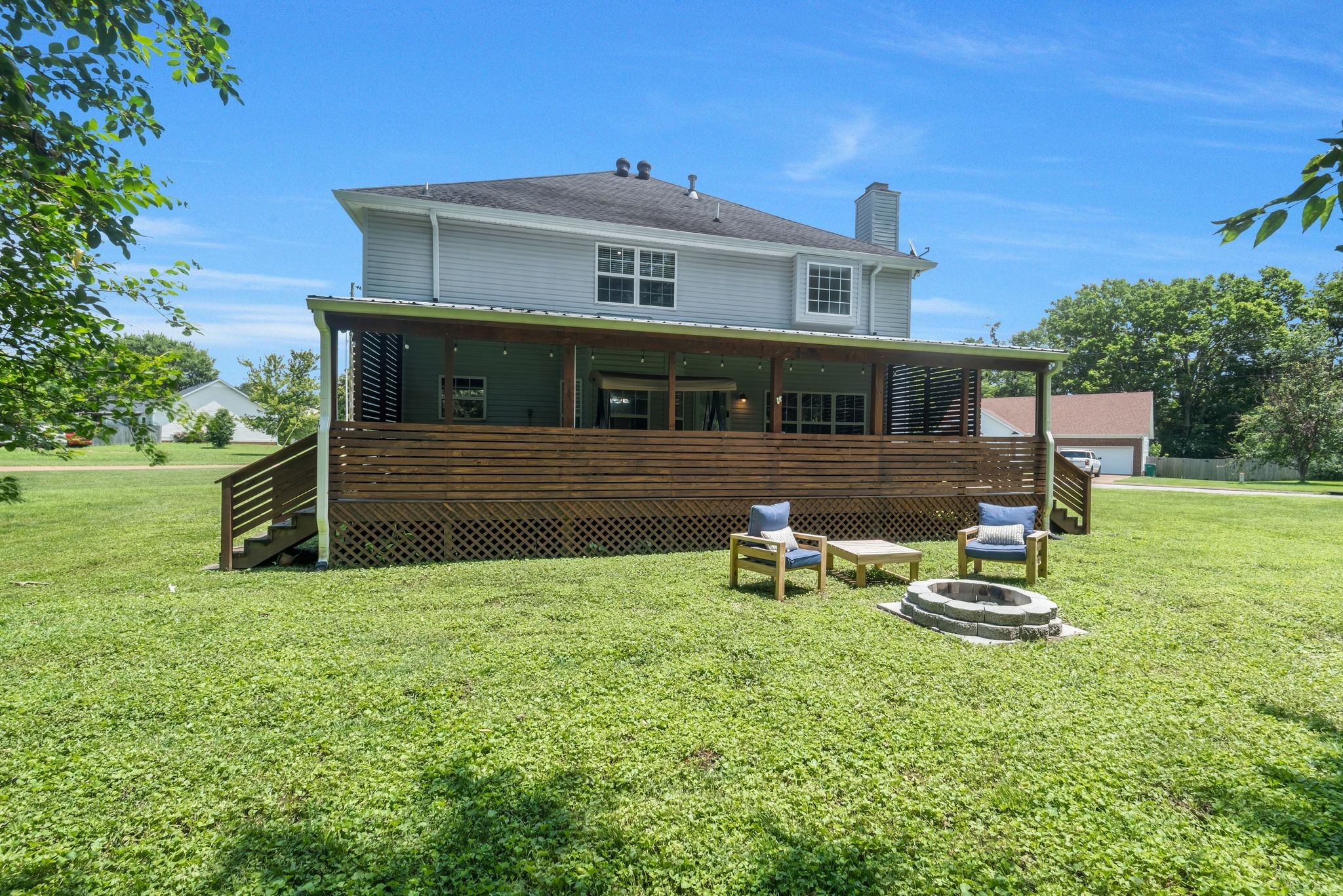 1757 Shane Drive Spring Hill, TN 37174 - Photo 4 of 30 a view of a house with backyard porch and sitting area