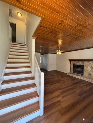 a view of entryway wooden floor and front door