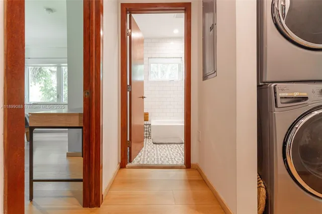 a view of an empty room with a window