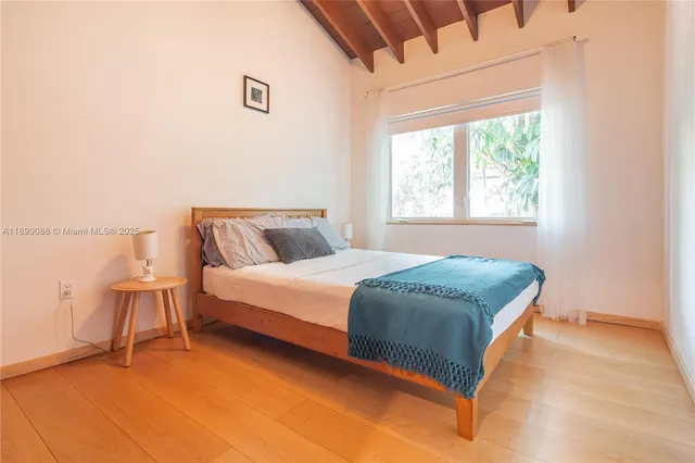 a view of workspace with furniture and windows