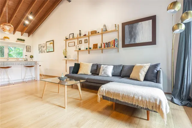 a living room with a couch and a table