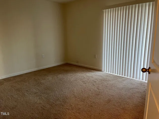 a view of a empty room with floor