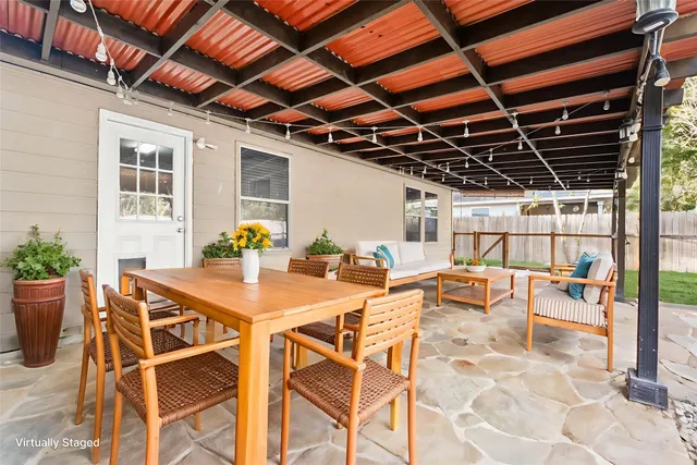 a front view of a house with a tub