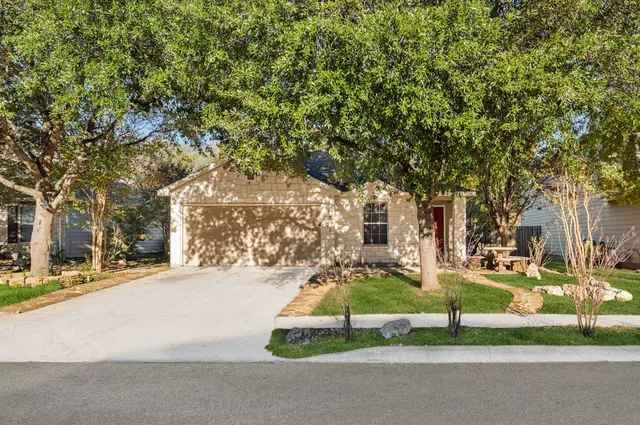 a view of a hallway with a white door