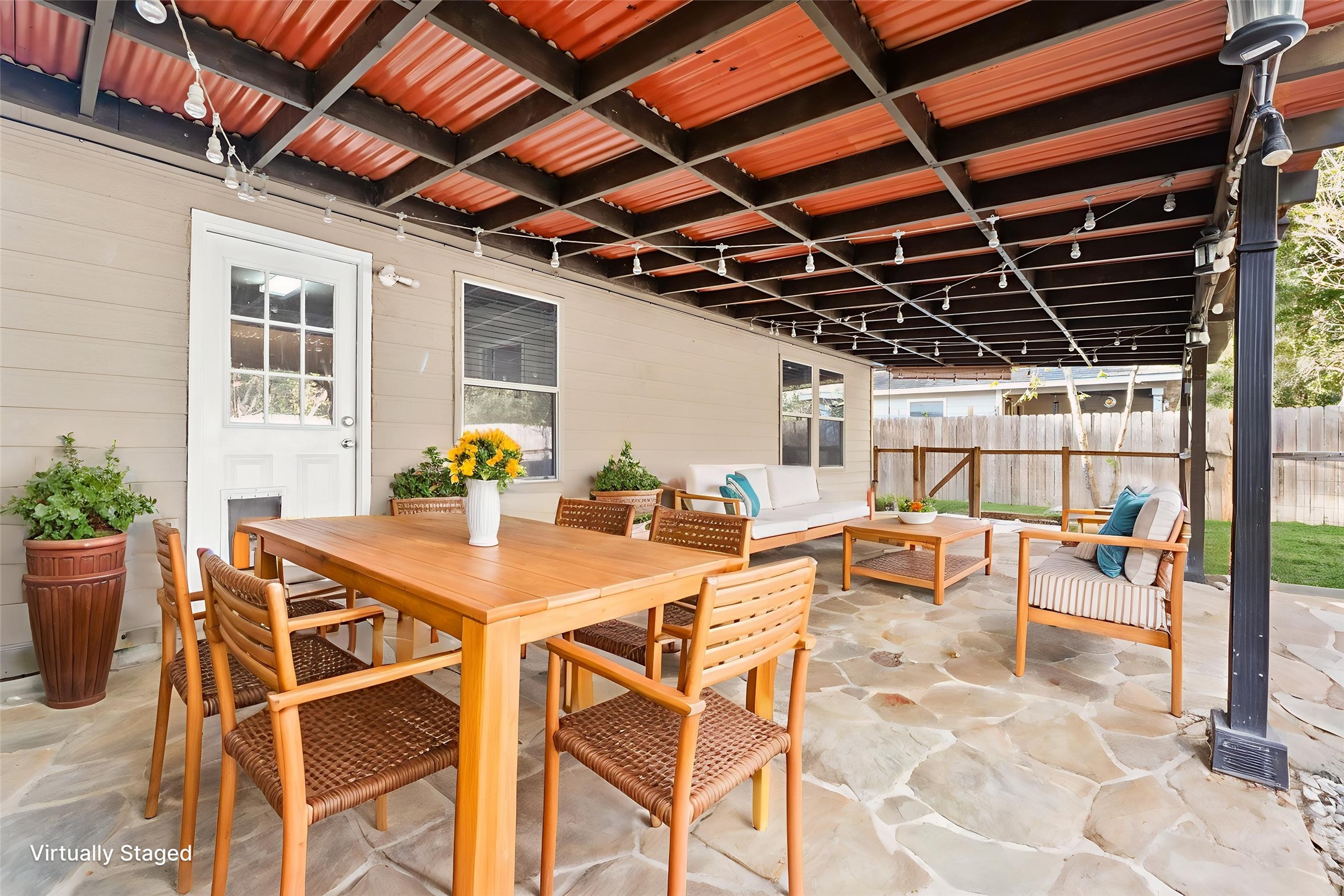 7731 Saddle Run Selma, TX 78154 - Photo 5 of 24 a view of a dinning table and chairs in patio