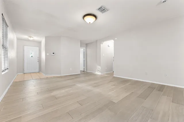 a view of a kitchen with a sink