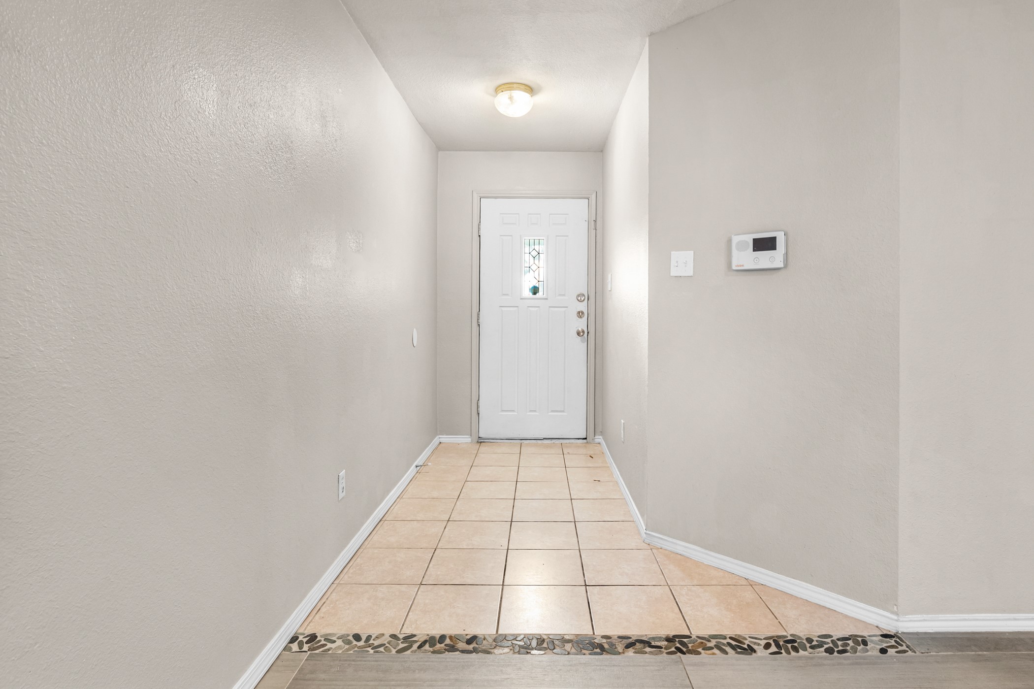 7731 Saddle Run Selma, TX 78154 - Photo 10 of 24 a view of a hallway with a white door