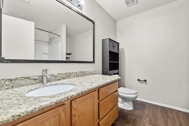 a bathroom with a tub and a shower