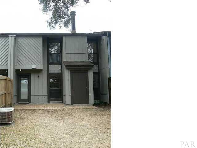 6045 Hilburn Road Pensacola, FL 32504 - Photo 18 of 18 View of back of home with patio and storage.