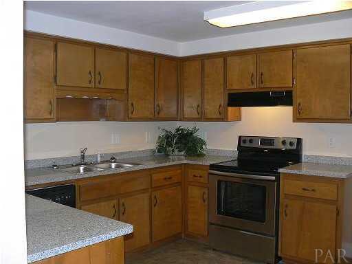 6045 Hilburn Road Pensacola, FL 32504 - Photo 6 of 18 Spacious kitchen has granite counter tops and all appliances including...