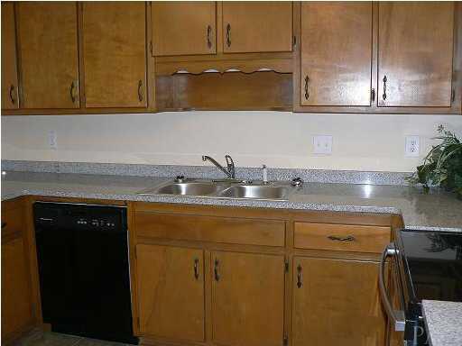 6045 Hilburn Road Pensacola, FL 32504 - Photo 8 of 18 Dishwasher and Electric stove.
