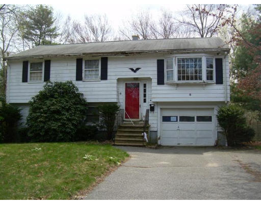 6 Sesame Street Billerica, MA 01821 - Photo 1 of 1 a front view of a house with a garden