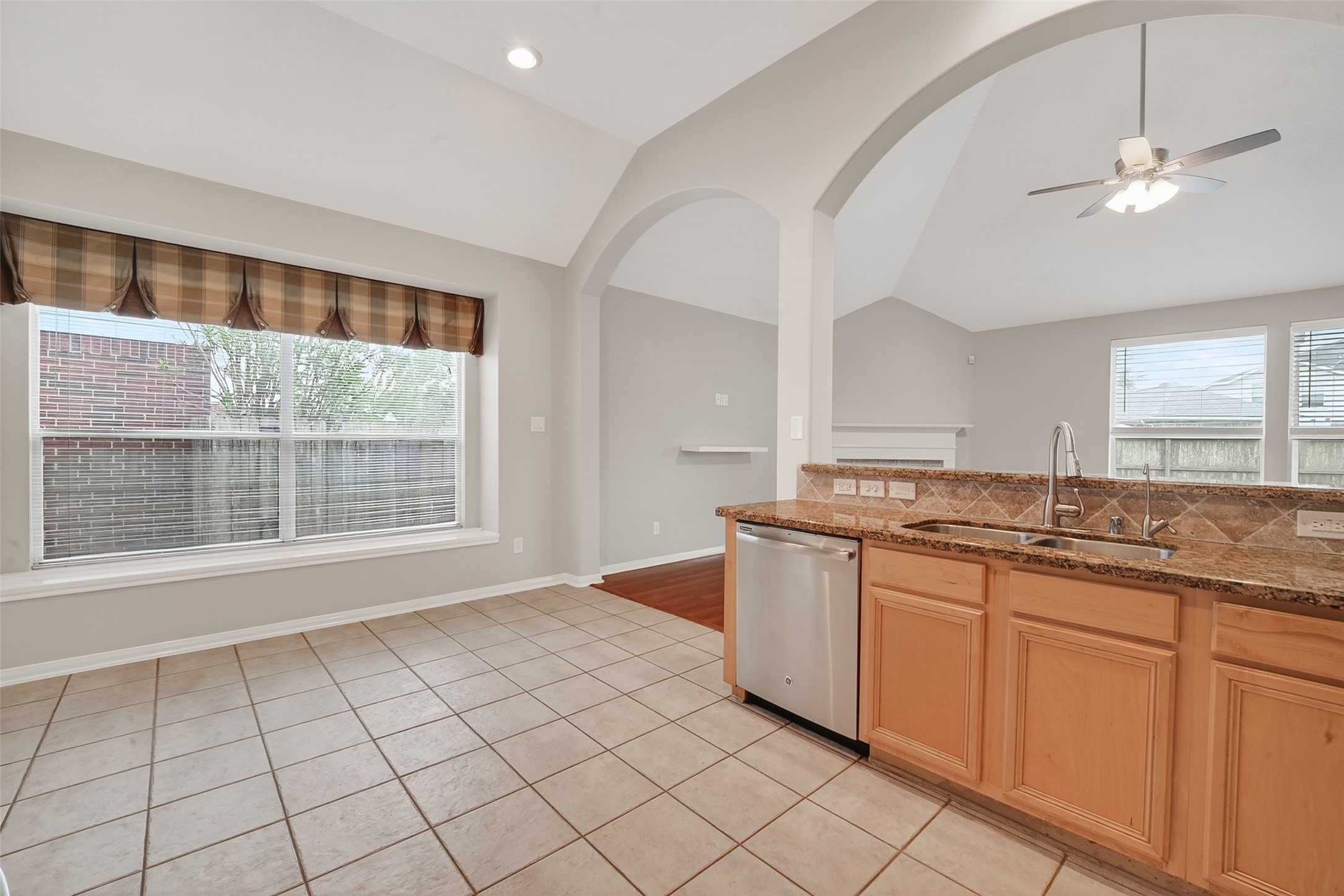 14308 Rocky Briar Lane Rosharon, TX 77583 - Photo 17 of 46 a large white kitchen with a sink and chandelier