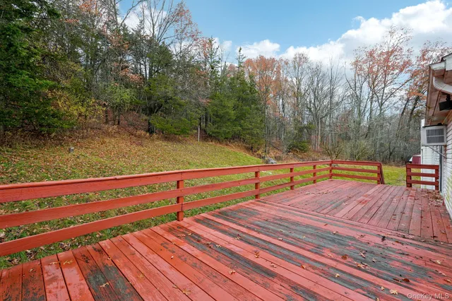 a view of a two chairs on the roof deck