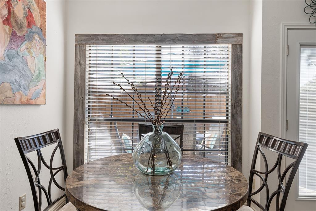 5619 Preston Oaks Road, Unit 502 Dallas, TX 75254 - Photo 12 of 33 a view of a dining room with furniture window and outside view