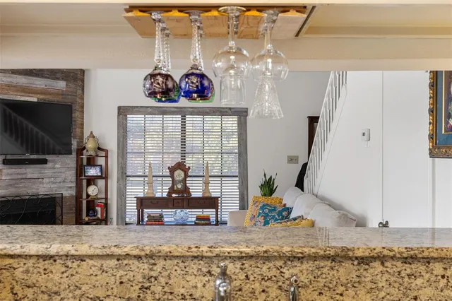 a view of a living room and a fireplace