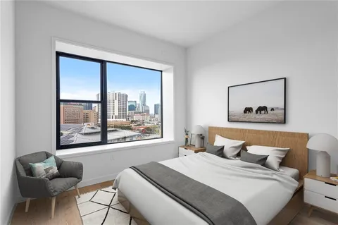 a bathroom with a white wall