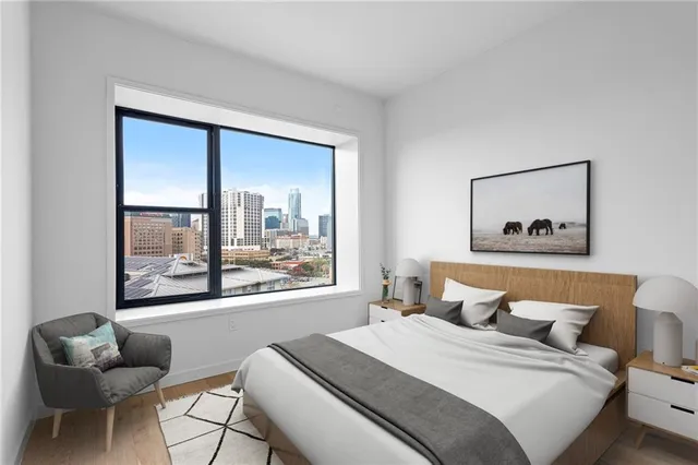 a bathroom with a white wall