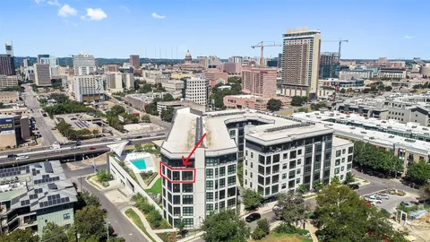 a view of swimming pool with outdoor seating