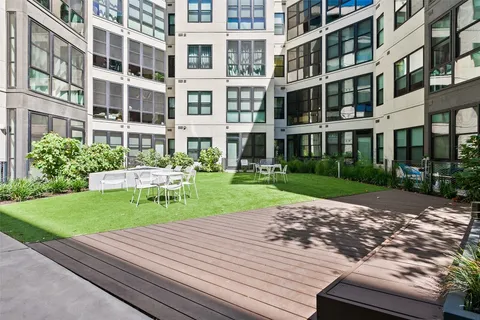 a view of hallway with shower