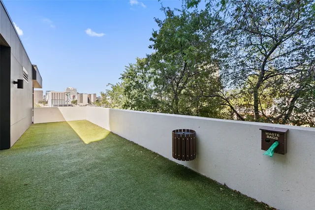 a view of city with tall buildings