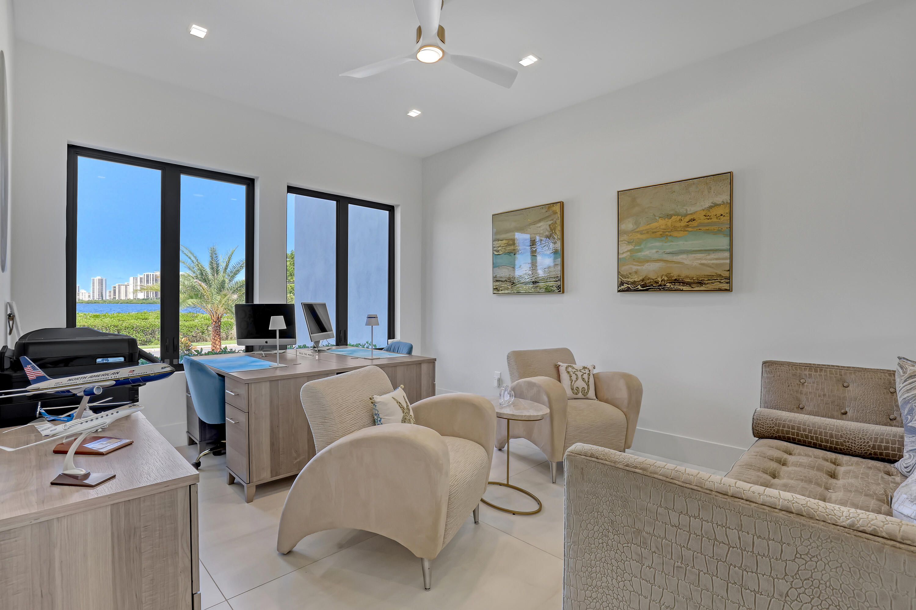 1161 Pine Point Road Riviera Beach, FL 33404 - Photo 14 of 58 a living room with furniture and large window