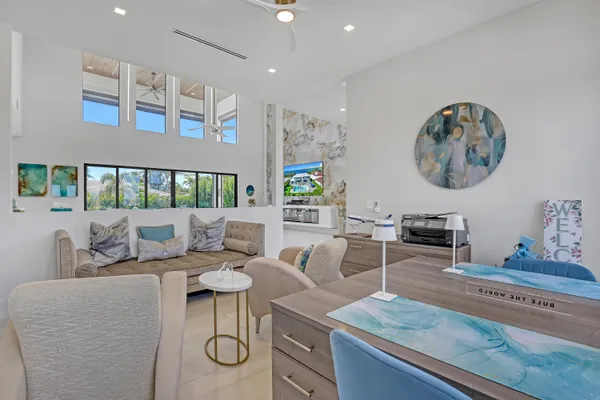 a view of a dining room with furniture window and outside view