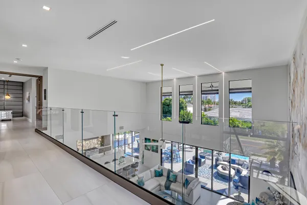 a spacious bedroom with a bed and a couch