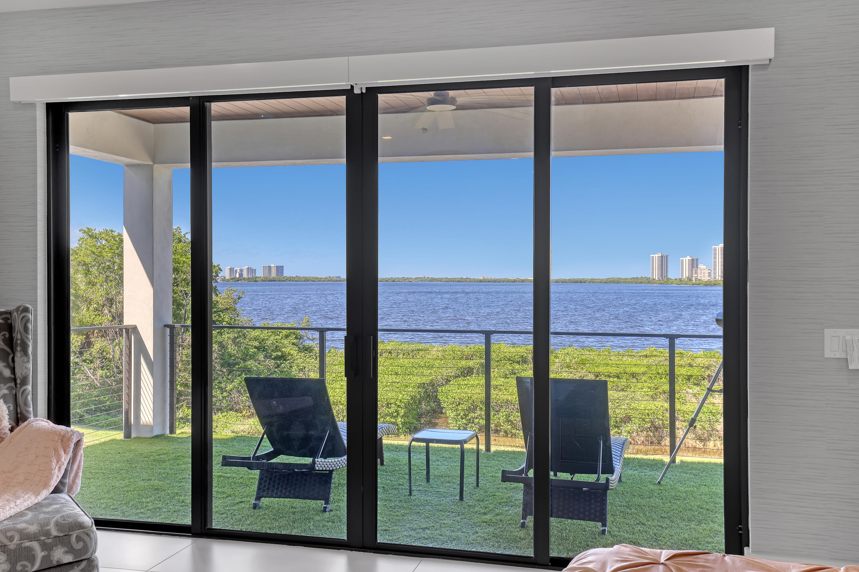 1161 Pine Point Road Riviera Beach, FL 33404 - Photo 29 of 58 a view of an outdoor from a porch
