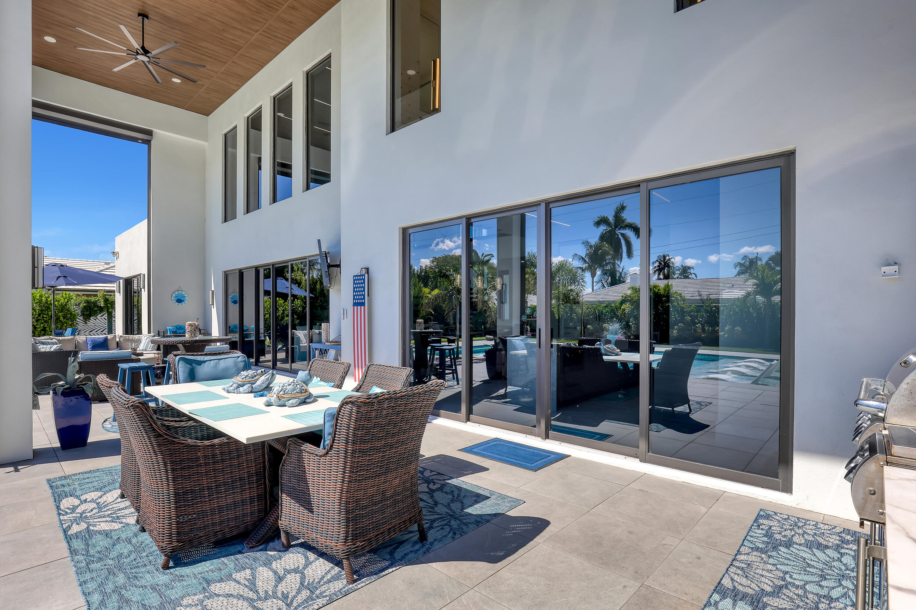 1161 Pine Point Road Riviera Beach, FL 33404 - Photo 50 of 58 a view of a dining room with furniture window and outdoor view