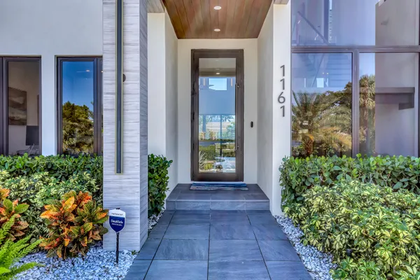 a view of entryway with livingroom and stairs