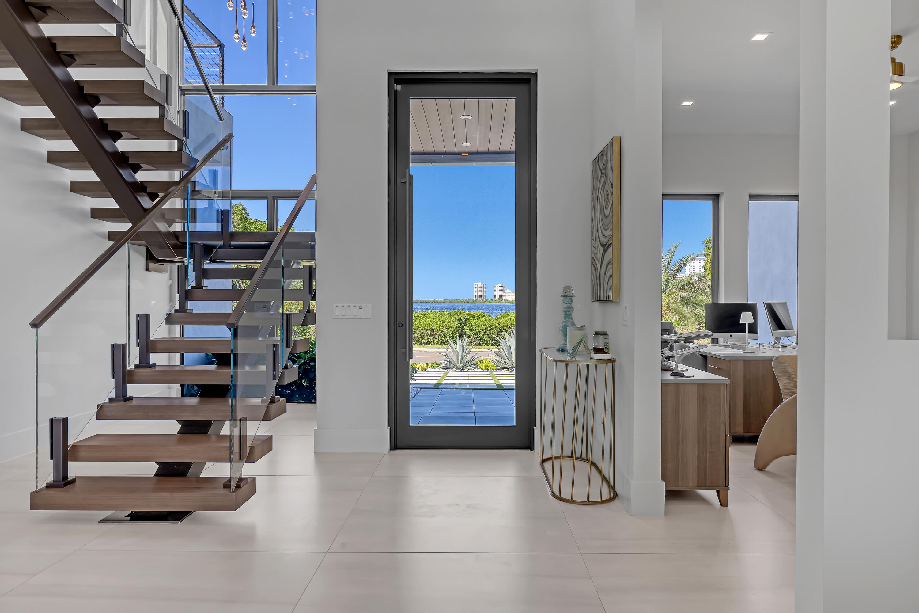 1161 Pine Point Road Riviera Beach, FL 33404 - Photo 6 of 58 a view of entryway with livingroom and stairs