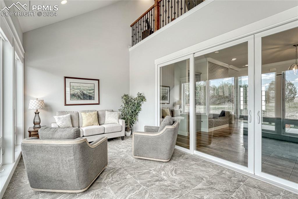 1183 2nd Street Penrose, CO 81240 - Photo 12 of 50 a living room with furniture and a glass door