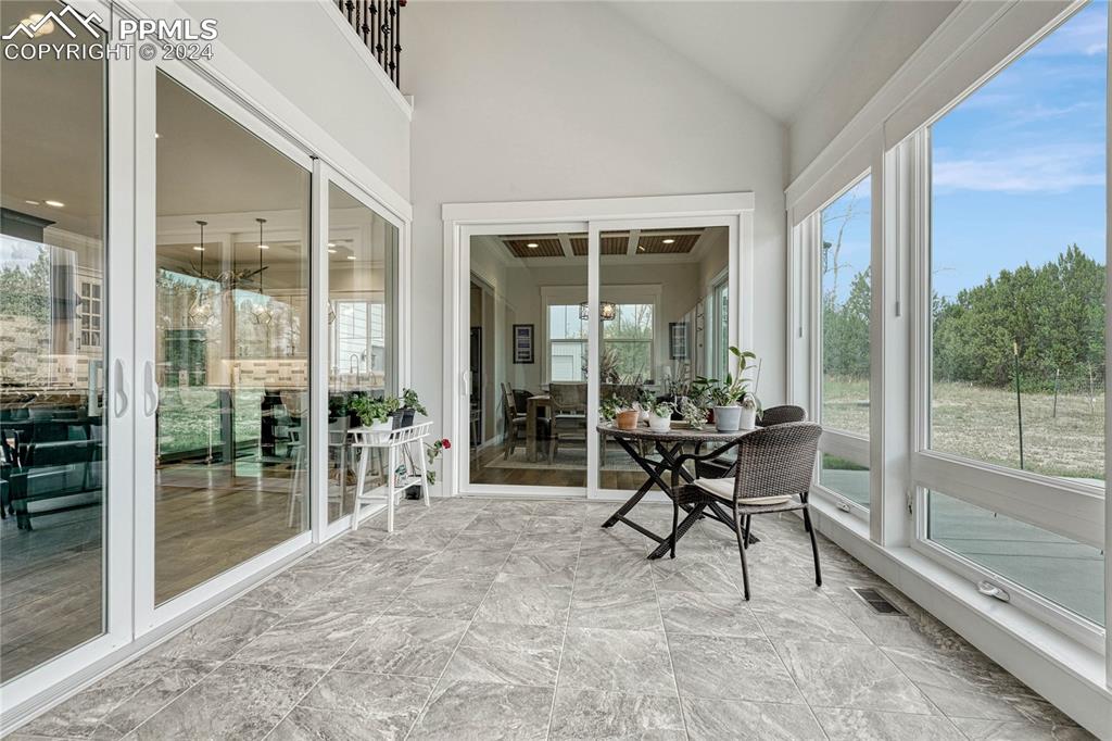 1183 2nd Street Penrose, CO 81240 - Photo 14 of 50 a work room with a large window and furniture