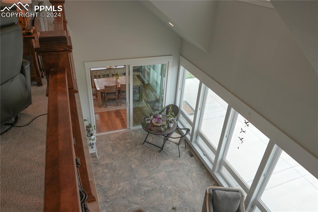 1183 2nd Street Penrose, CO 81240 - Photo 20 of 50 a living room with furniture and a floor to ceiling window