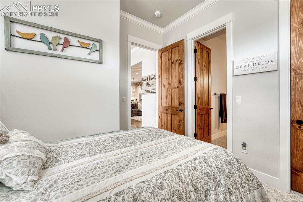 1183 2nd Street Penrose, CO 81240 - Photo 22 of 50 a bedroom with a bed and a window