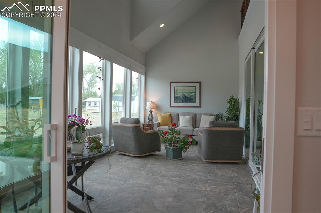 1183 2nd Street Penrose, CO 81240 - Photo 30 of 50 a living room with furniture and a potted plant