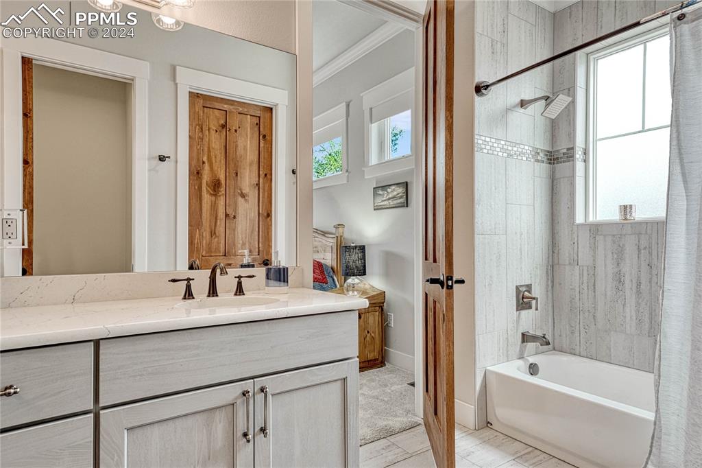 1183 2nd Street Penrose, CO 81240 - Photo 37 of 50 a bathroom with a tub sink and mirror