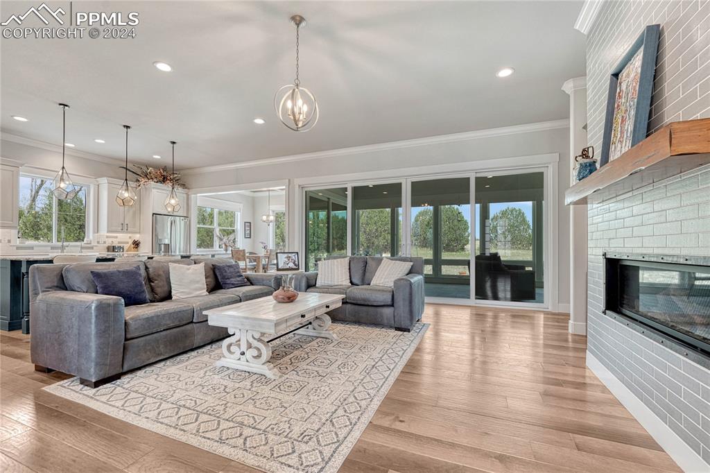 1183 2nd Street Penrose, CO 81240 - Photo 8 of 50 a living room with furniture and a fireplace