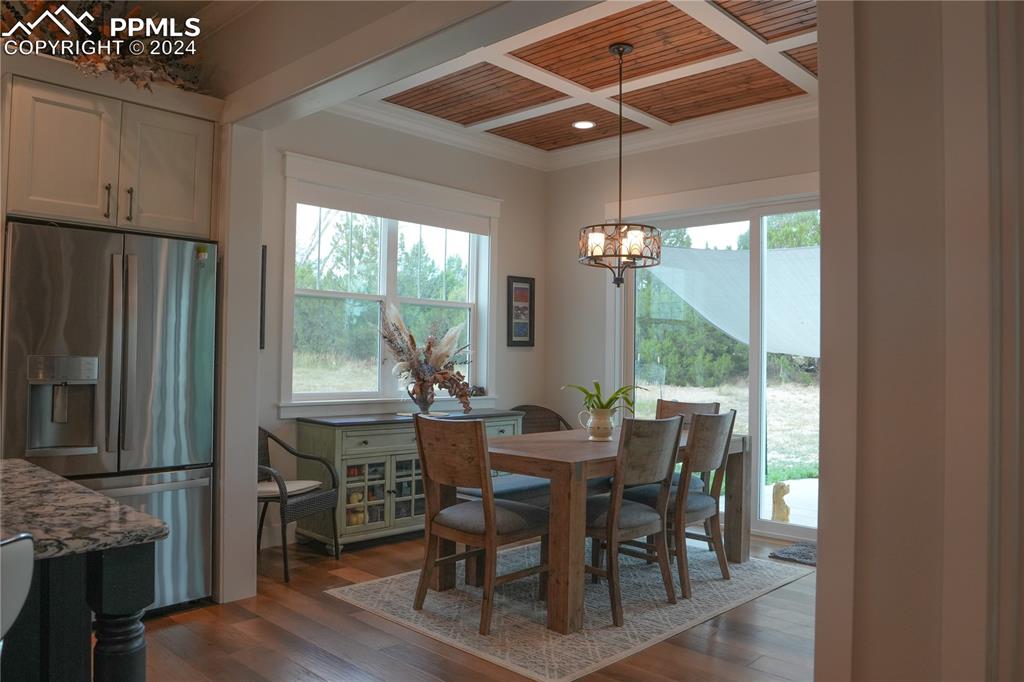1183 2nd Street Penrose, CO 81240 - Photo 10 of 50 a view of a dining room with furniture window and outside view