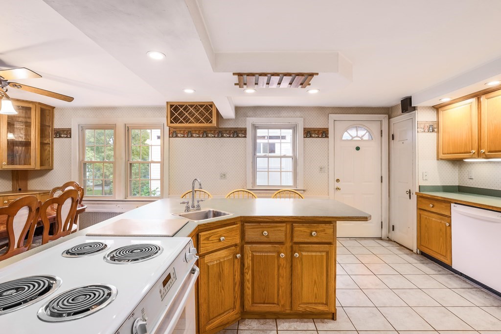 30 St Elmo Road Worcester, MA 01602 - Photo 27 of 42 a kitchen with a sink a stove and cabinets