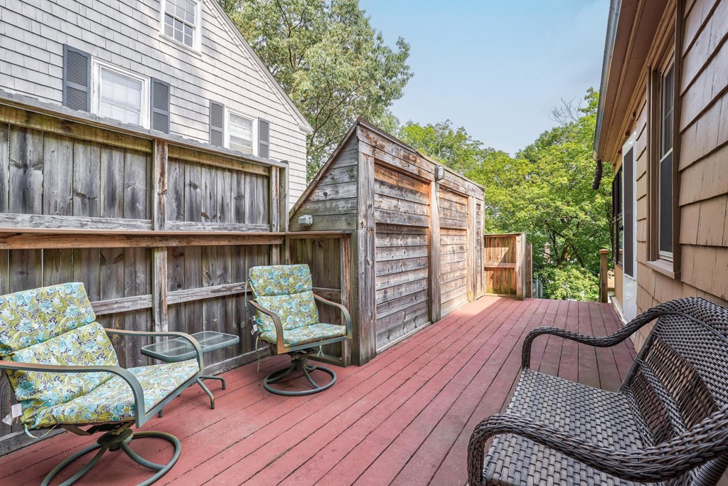 30 St Elmo Road Worcester, MA 01602 - Photo 3 of 42 a view of a chair and tables in the balcony