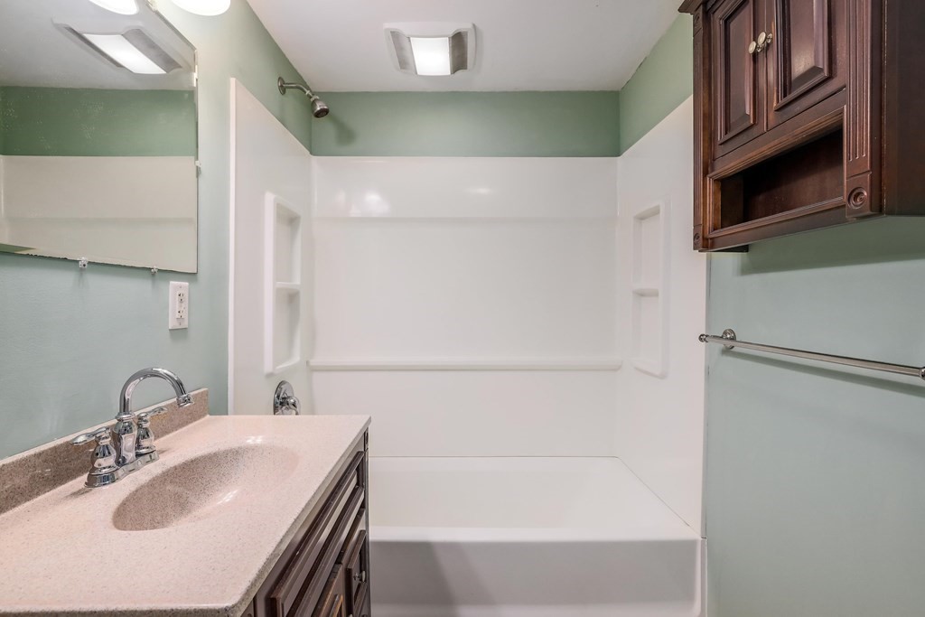 30 St Elmo Road Worcester, MA 01602 - Photo 35 of 42 a bathroom with a sink and a bathtub