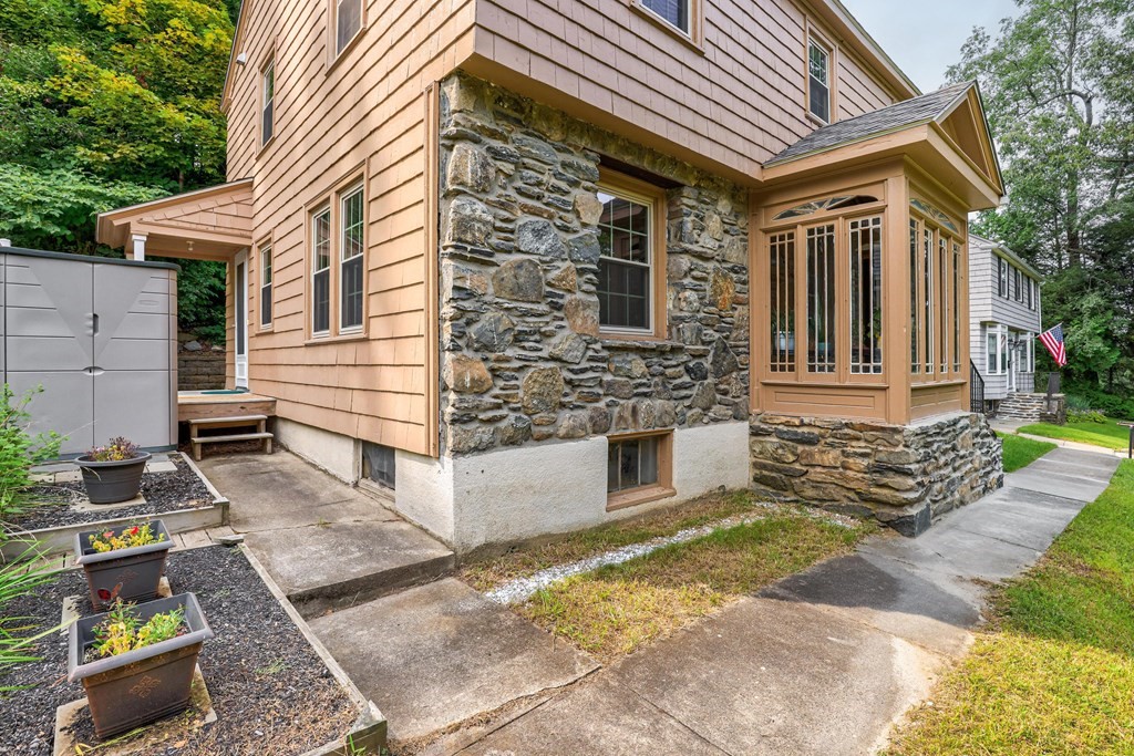 30 St Elmo Road Worcester, MA 01602 - Photo 7 of 42 a front view of a house with garden