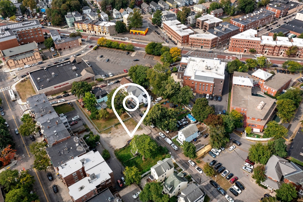 26 Notre Dame Street Boston, MA 02119 - Photo 7 of 7 an aerial view of residential house with outdoor space
